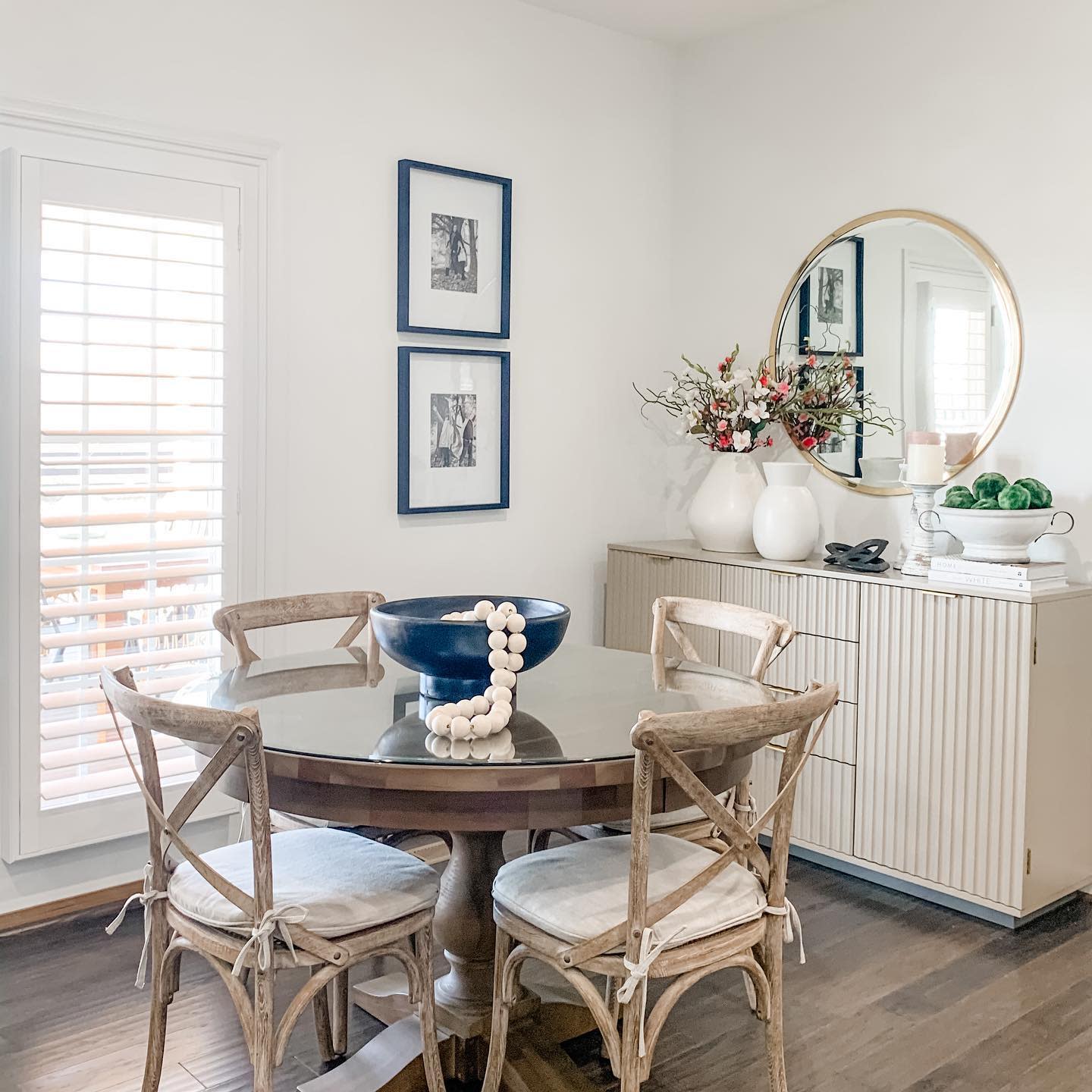 country style dining room glass topped table and chairs blue bowl decoration 